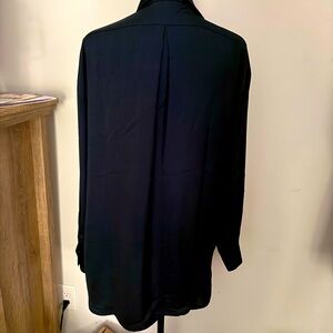 NWT beautiful silky Navy blue top with long sleeves. Meant to be oversized.